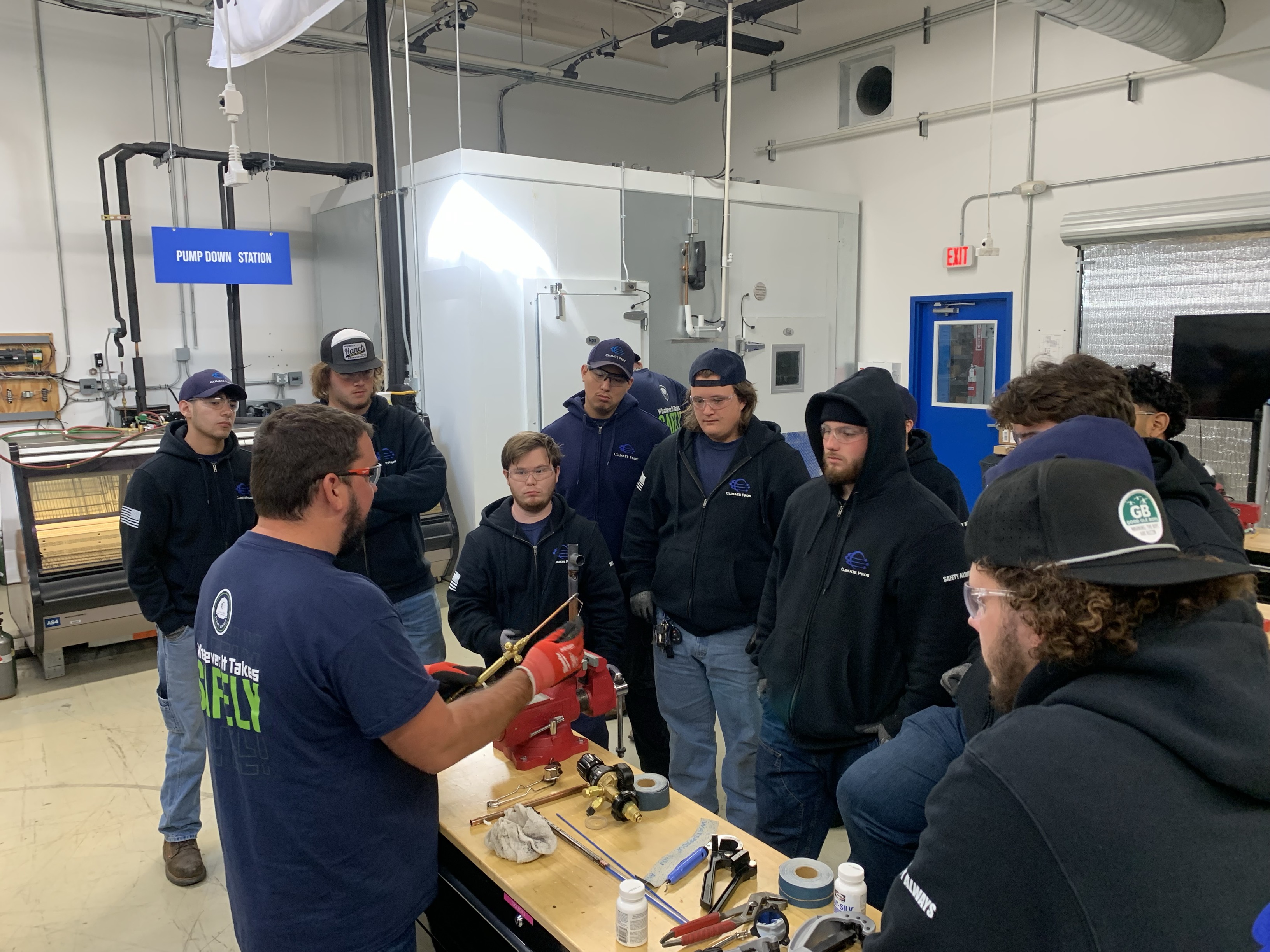 Technicians in a hands-on session at the Climate Pros University Refrigeration Academy training lab