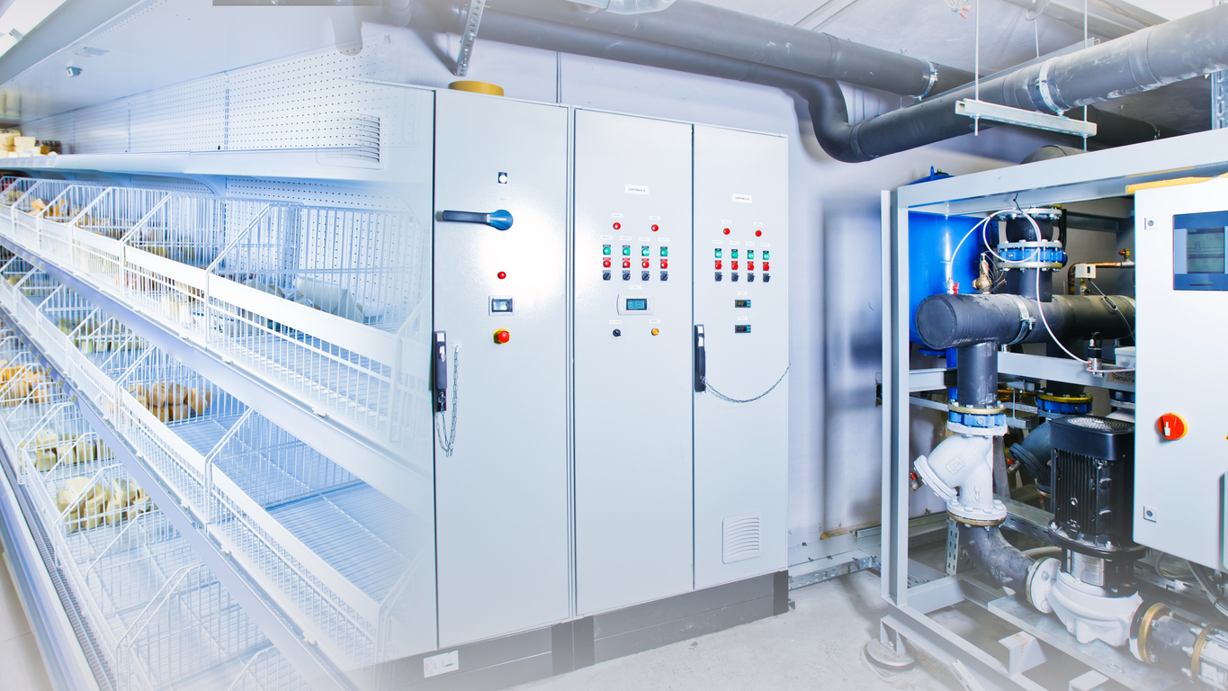 Technician working on commercial refrigeration and air conditioning equipment
